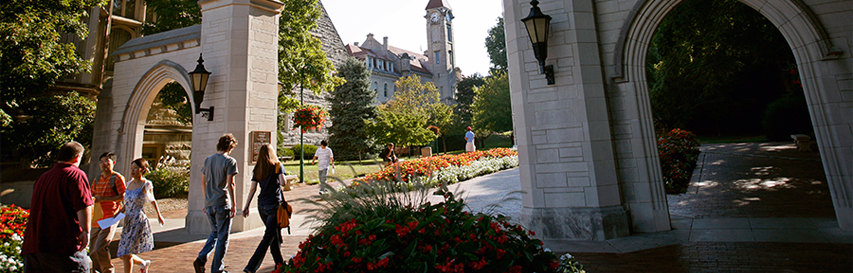 Students walk through the Sample Gates on the Indiana University campus in Bloomington.