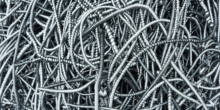 Closeup on a pile of spiral metal shavings