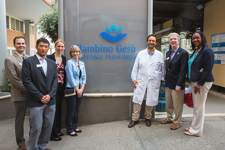 Kelley Physician MBA students stand in front of the Bambino Gesù Children's Hospital in Rome, Italy.