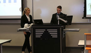 Kelley business students perform a classroom presentation during an I-Core project.